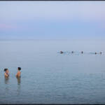 MinimalAbstract &raquo; Teenagers in calm waters after sunset